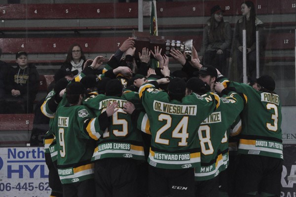 Portage Terriers hoist the Anavet Cup at the Civic Centre. Photo by John Cairns