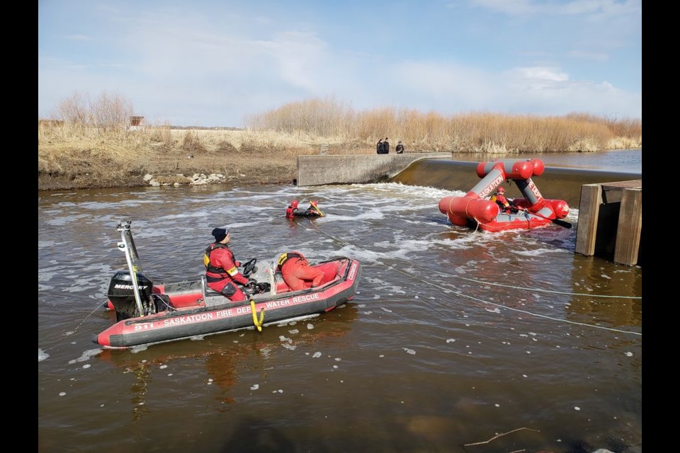 The Saskatoon Fire Department brought their Creature Craft which is a unique pontoon-styled floatation unit specially designed to maintain stability while searching turbulent waterways. As seen in the photo, from April 30, the Saskatoon Fire Department was assisting with one of their watercraft and the divers were from the RCMP Underwater Recovery Team. Photo supplied.