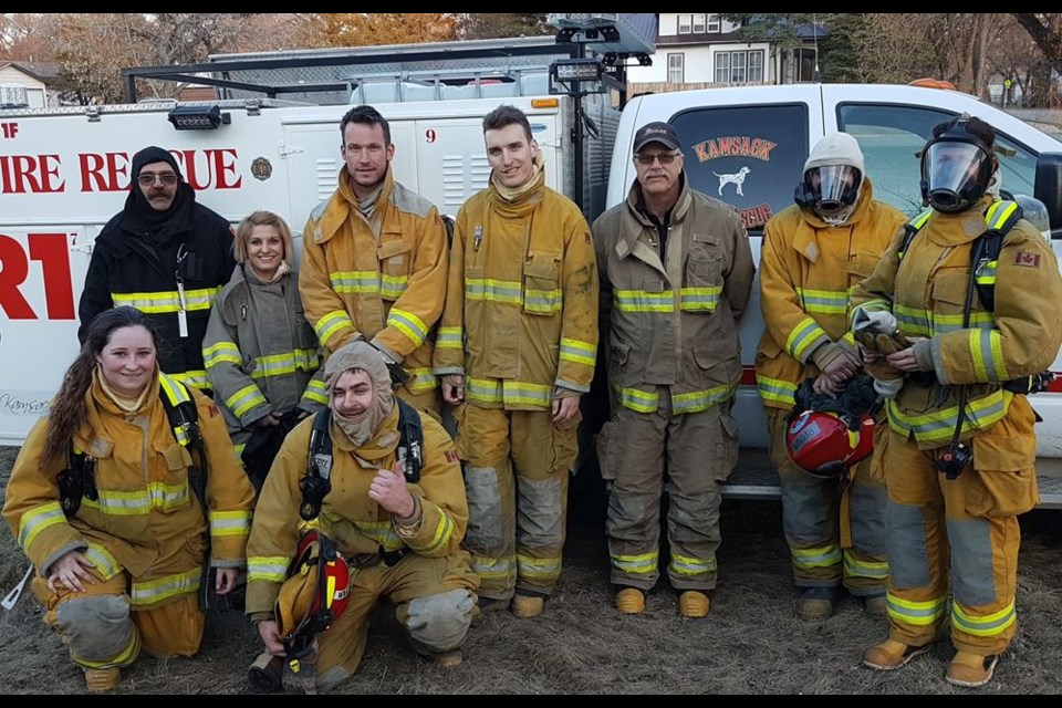 Members of the Kamsack Volunteer Fire Department (KVFD) participated in a training exercise on May 8. From left, were: (back) Ken Thompson, fire chief; Lieut. Kristin Johnson, acting scene commander; Jordan Guenther, Austin Guenther, Bruce Thomsen, assistant fire chief; Jordan Green, cadet, and Pam Rose, and (front, kneeling) Delany Murphy and Dillon Chernoff.