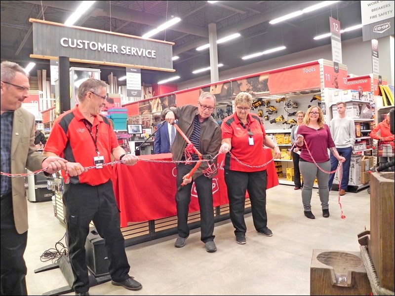 Delta Co-op held their official grand opening May 15 on a rainy Wednesday, but that didn’t dampen the enthusiasm for many people who came out to enjoy a the ribbon cutting, grand opening specials, a charity barbecue and special miniature pony wagon rides for the kids.