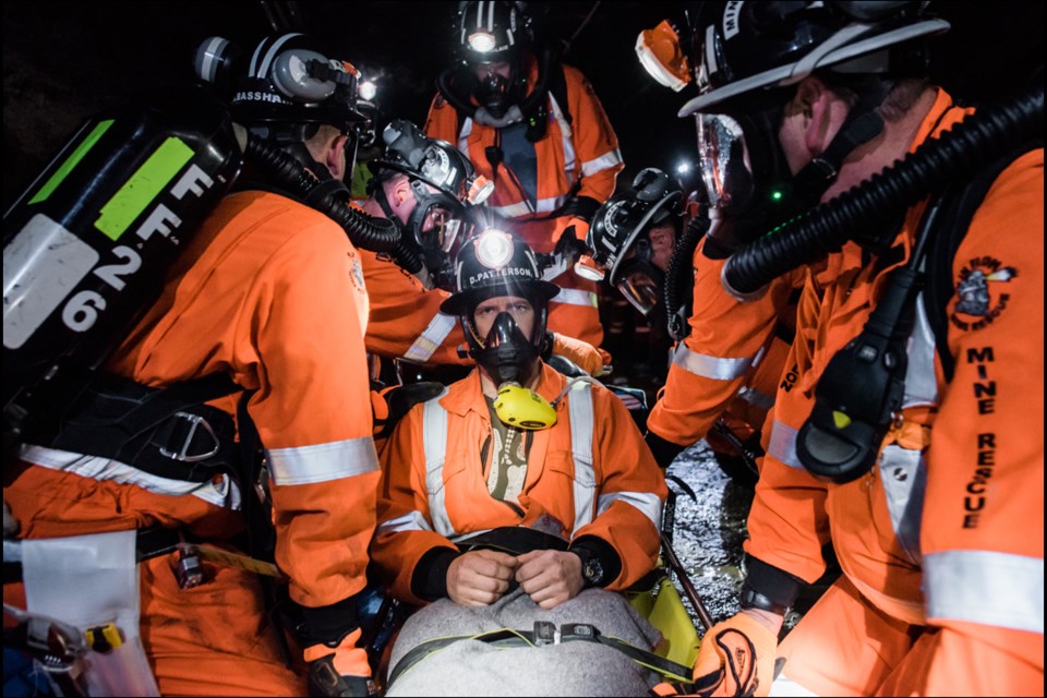 Hudbay Flin Flon mine rescue team members Mike Bassham, Dustin Patterson, Rob Johnson, David Green, Jarrod Ritch and Mike Desjarlais take part in an underground rescue drill. - PHOTO BY BRANDY BLOXOM