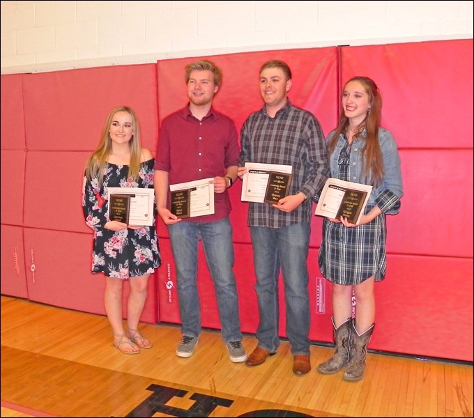 UCHS students Courtney Smith, Tyson Moon, Pearson Bast and Kerrigan Bowey were honoured at UCHS awards night June 4 and all won the UCHS leadership high for boy or girl in the senior and junior category. Photos by Sherri Solomko