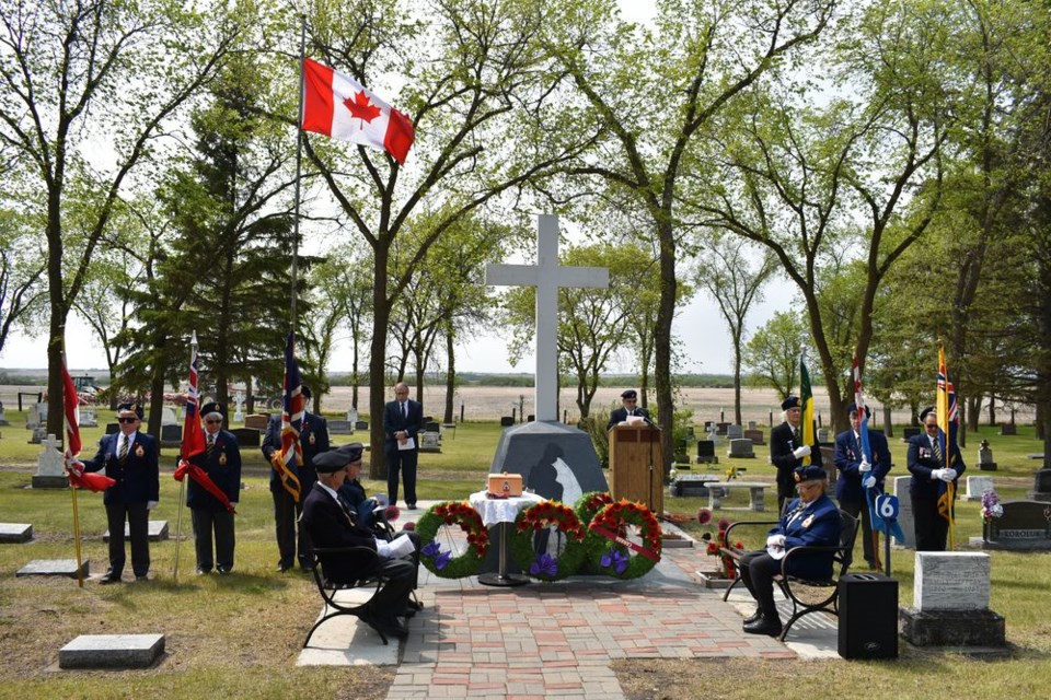 Members of the Kamsack branch of the Royal Canadian Legion and their supporters assembled at the Legion’s cenotaph at Riverview Cemetery in Kamsack on June 2 for the annual Decoration Day service, which included observance of the 75th anniversary of D-Day as well as a spreading-of-the-ashes ceremony.