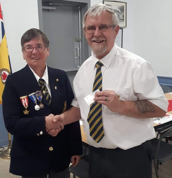 As vice-president of the Kamsack branch of the Royal Canadian Legion, Sharon Rudy had the honour of presenting Jim Woodward with a 55-year bar plus the Sovereign’s Medal for Volunteers during a Decoration Day reception at the Legion Hall on June 2.