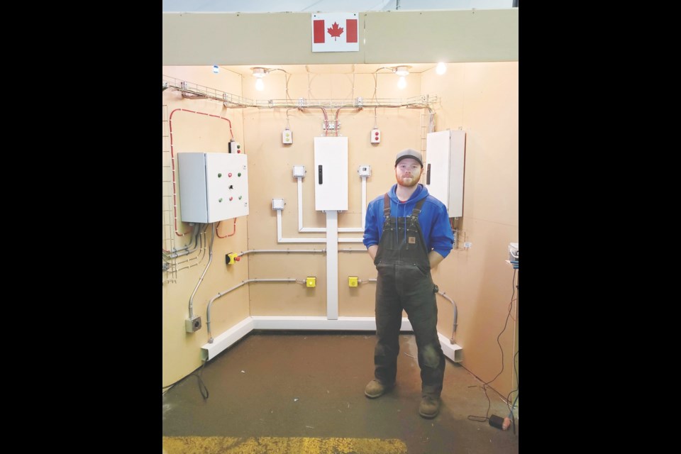 Ryan Folk with the project he completed at the Skills Canada nationals competition in Halifax. He has advanced to the World Skills event in Russia in August. Photo submitted