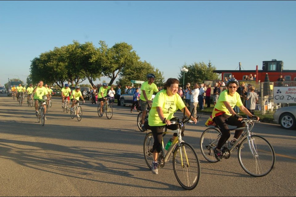 This is a photo of the participants arriving at the reception held at the end of the eighth annual Old Dog Run in 2014 when $20,000 was raised for the Kamsack Medical Clinic.