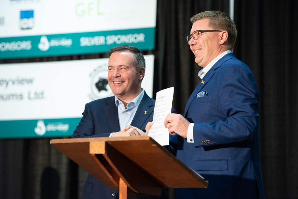 The two premiers signed a memorandum of understanding to align service rig regulations between Saskatchewan and Alberta