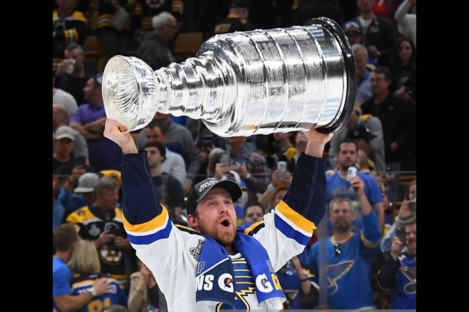 Jaden Schwartz skated the ice holding the Stanley Cup which he helped the St. Louis Blues win on June 12, defeating the Boston Bruins 4-1.