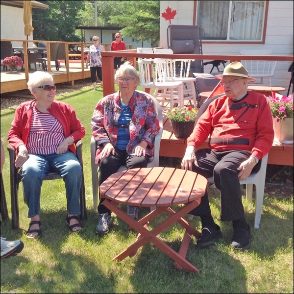 Every summer for many years, the Quinn family have been celebrating Canada Day at their beautifully decorated summer home in Meota. This year they were happy to have a friend from Leduc, Alta., Iris Lawrence, join them and their many friends for the occasion. Iris and Norma have been friends for more than 75 years. Trevor Quinn did the honour of raising the flag, with help from his daughter Kathy Richardson from North Battleford. Then everyone joined in singing O Canada, followed by a toast to Canada. Then Kathy’s family served refreshments and birthday cake to the sizeable gathering. Photo submitted by Lorna Pearson