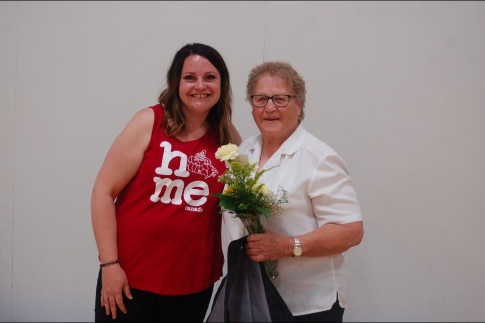 Alice Delawski of Endeavour was presented with a special gift in acknowledgement of driving school bus for 46 years. From left, were: Allyson Rock, presenter and Delawski.