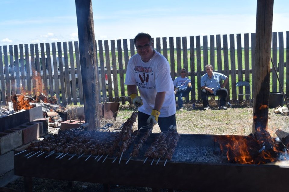 At the 75th Anniversary Veregin Shishliki Barbecue on June 29, Dereck Wolkowski was one of the volunteers who barbecued approximately 1,250 pounds of meat.