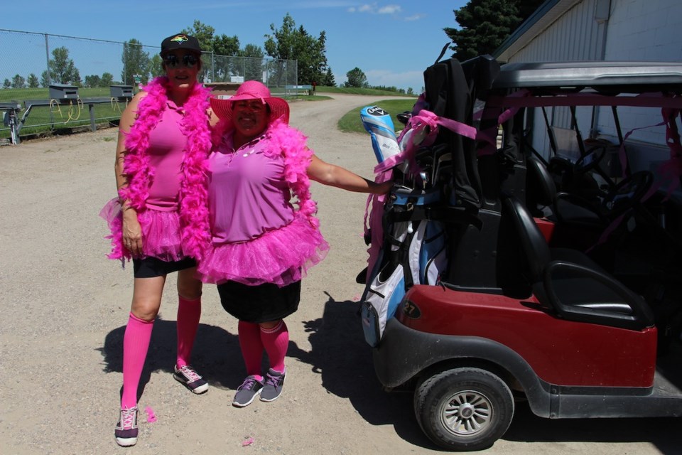 Jody Lang and Heather Lajambe, all dressed up for the Pink Ribbon Classic.