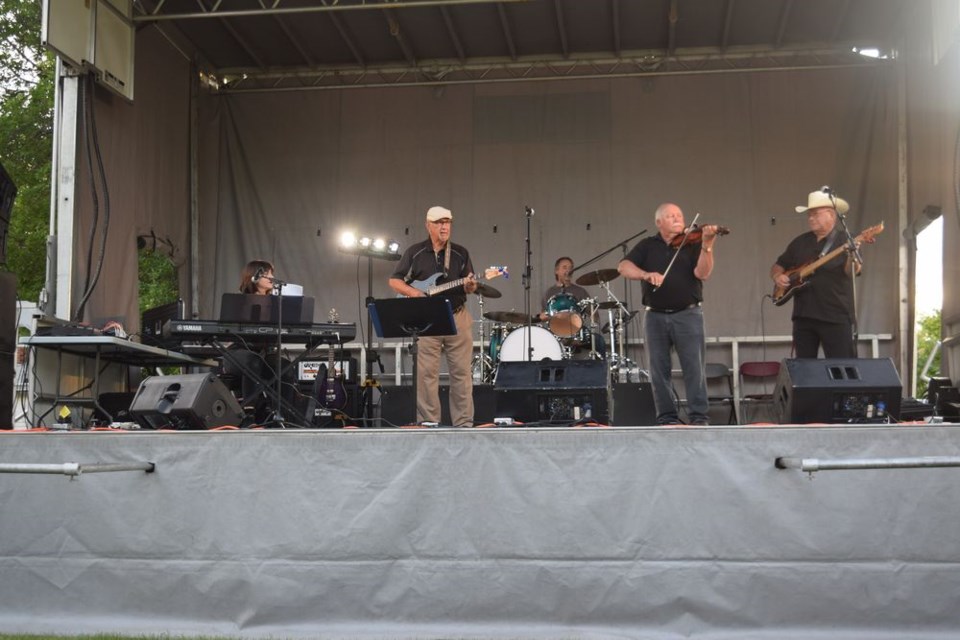 During the open mic segment, Whitesand River Band played a variety of old-time music. From left, were: Gillian Rice (vocals, keyboard), Glen Leson (vocals, guitar), Grant Dutchak (drums), Dan Stacheruk (violin) and Hank Okrainetz (bass.)