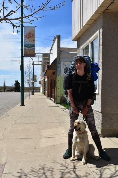 On May 21 Melanie Vogel, accompanied by her dog Malo, stopped in Kamsack while walking across Canada on The Great Trail.