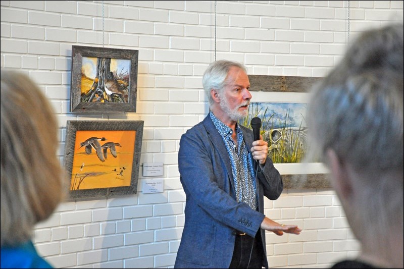 Artist Grant McConnel speaking about some of the work at the Chapel Gallery Members Exhibition Thursday last week. His comments included advice and words about how art affects viewers. The member's show goes on into September.