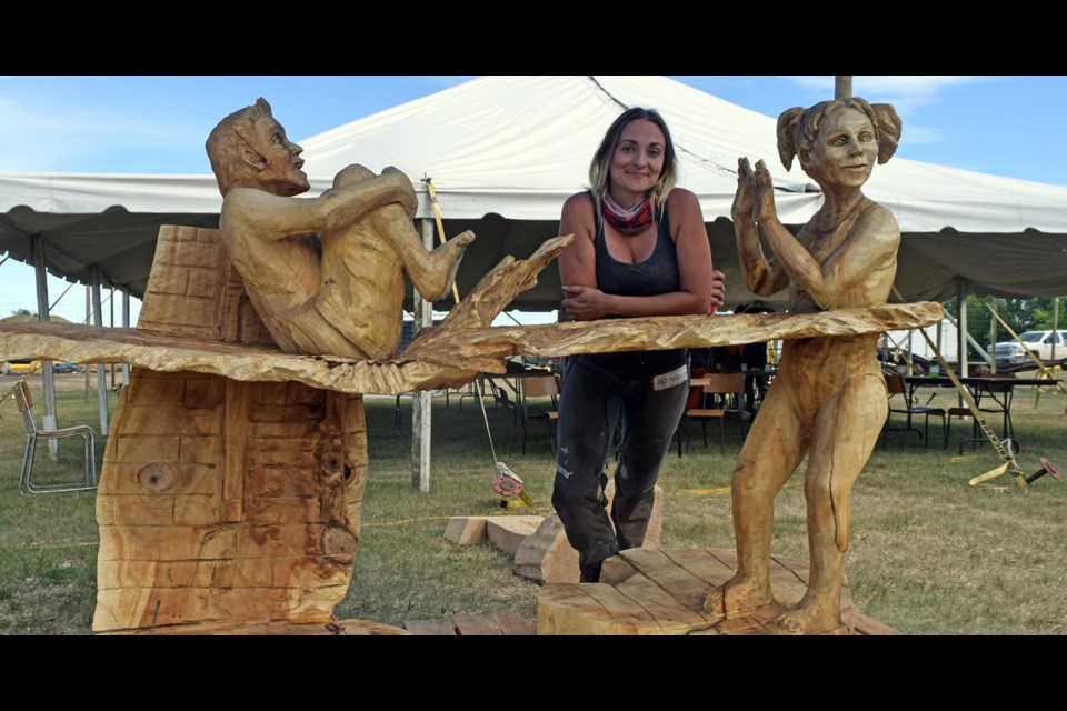 Carver Marina Cole from Medicine Hat, Alta, won carvers’ choice, people’s choice, and the first place prize of $3,500 at Maple Madness for her wooden creation, “Cannonball”. Photo by Kiernan Green.