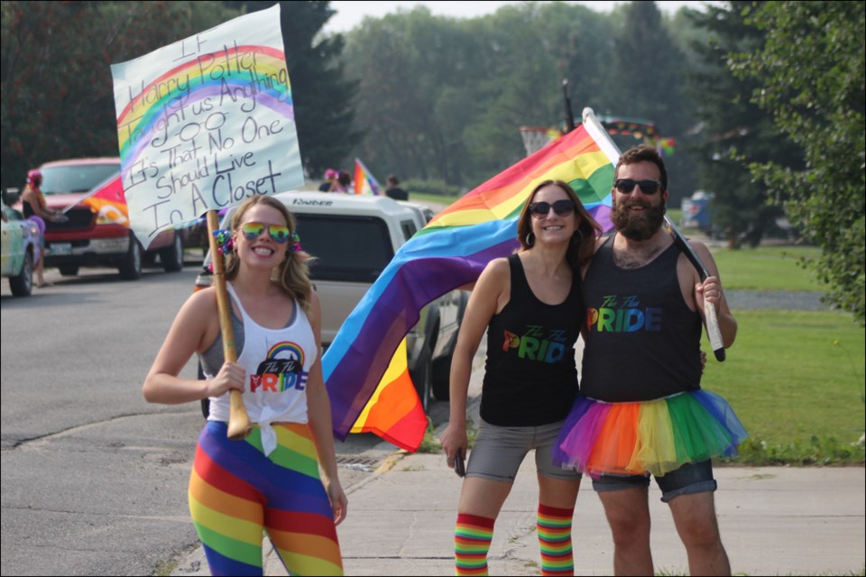 Mari Pettersen, Joanna Dauk and Alain Lachapelle prepare for the 2018 Flin Flon Pride parade. This year’s edition will include several new events, along with the parade August 17. - FILE PHOTO
