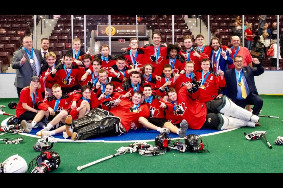 Team Canada celebrates after winning the gold medal at the 2019 World Junior Lacrosse Championships. Photo submitted