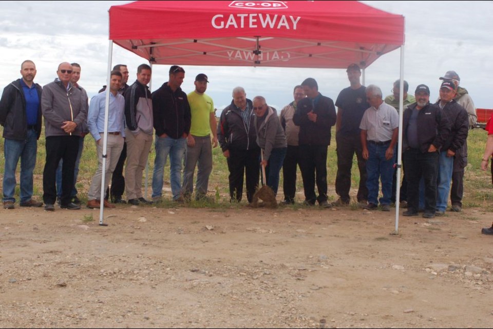 The Gateway Coop members, accompanied by general contractors and Federated Co-op officials gathered to help turn the sod on the new Preeceville Home Centre, C-store and lumber store on August 12. Lyle Olson, Gateway Co-op president, middle, and Brad Chambers, General Manager did the official sod turning.