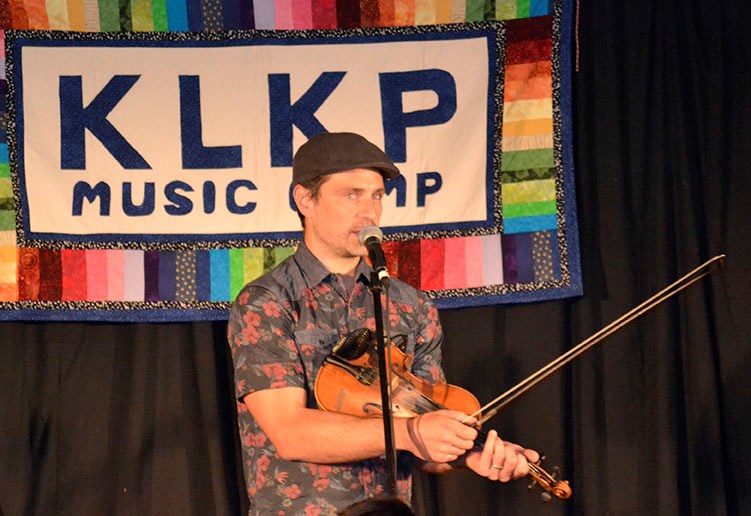 Juno award winner Karrnnel Sawitsky delights the audience with his fiddle music at the Kenosee Lake Kitchen Party 2019.