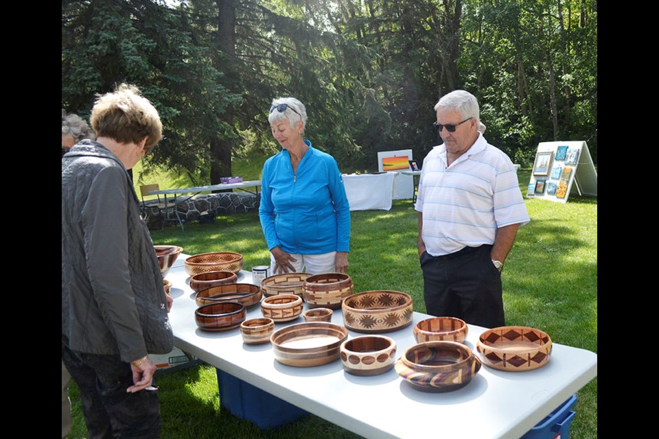 Marion and Don Evans of Kenosee Lake share their enthusiasm for Wood Made Beautiful, consisting of segmented bowls, cutting boards and pens.