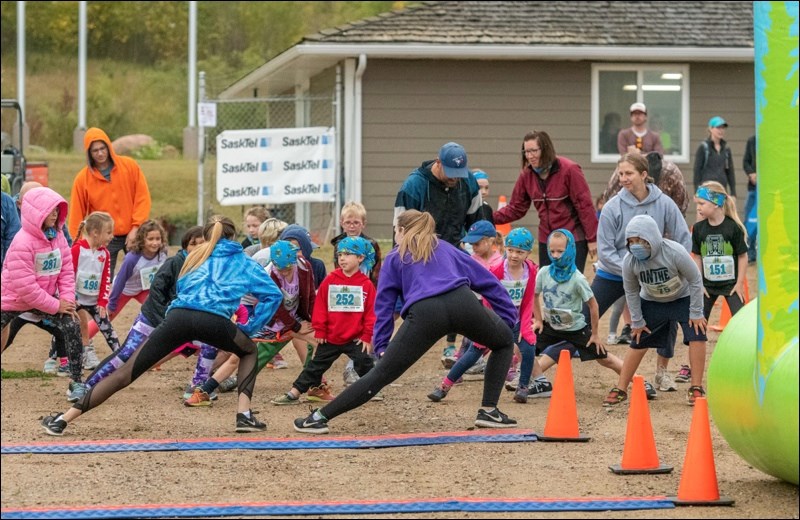 Warming up the kids before their run.