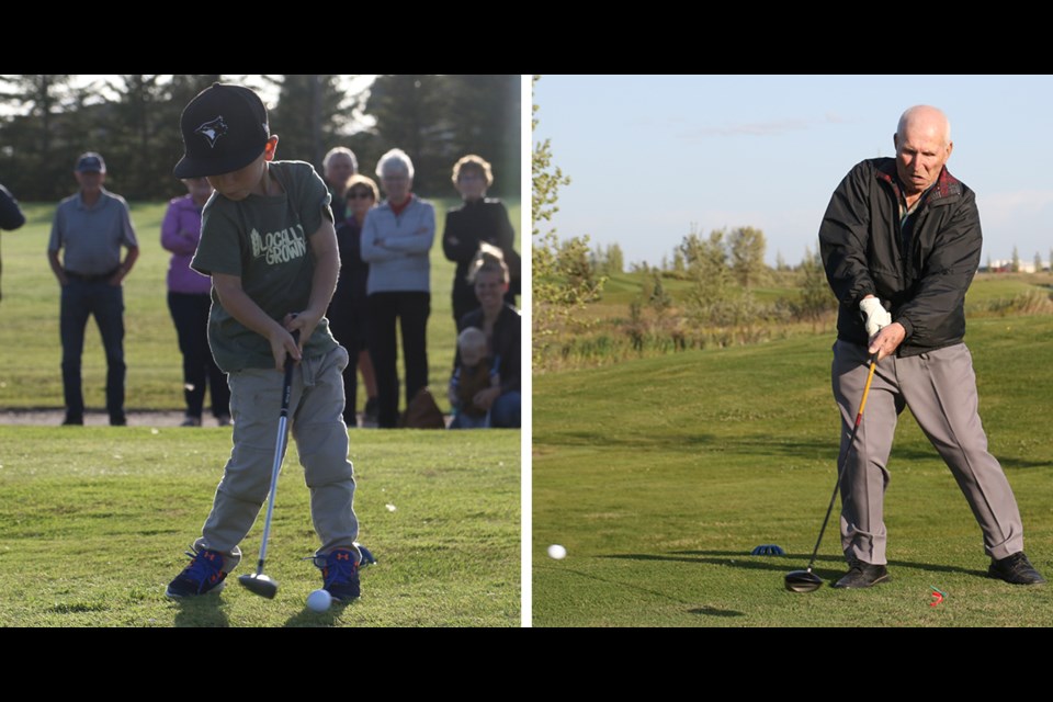 To celebrate their 75th anniversary on Aug. 28, the Humboldt Gold Club had one of their youngest members, Jack Unrau and one of their oldest, Mike Sowtis, do a ceremonial tee off. Photo by Devan C. Tasa