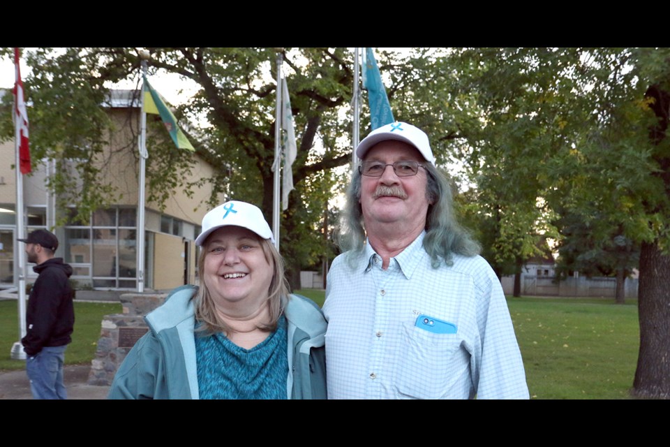 Evelyn and Arnold Schellenberg, from the Nipawin area, travelled to Humboldt for the ovarian cancer awareness month flag raising in honour of their daughter Marcie Wolfater, who died of the disease. Photo by Devan C. Tasa