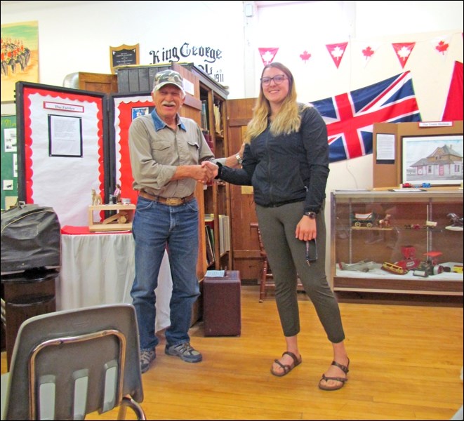 Reuben Rempel of the Borden Museum board and Leah Williamson, summer student on her last day of work at the museum. Photos by Lorraine Olinyk