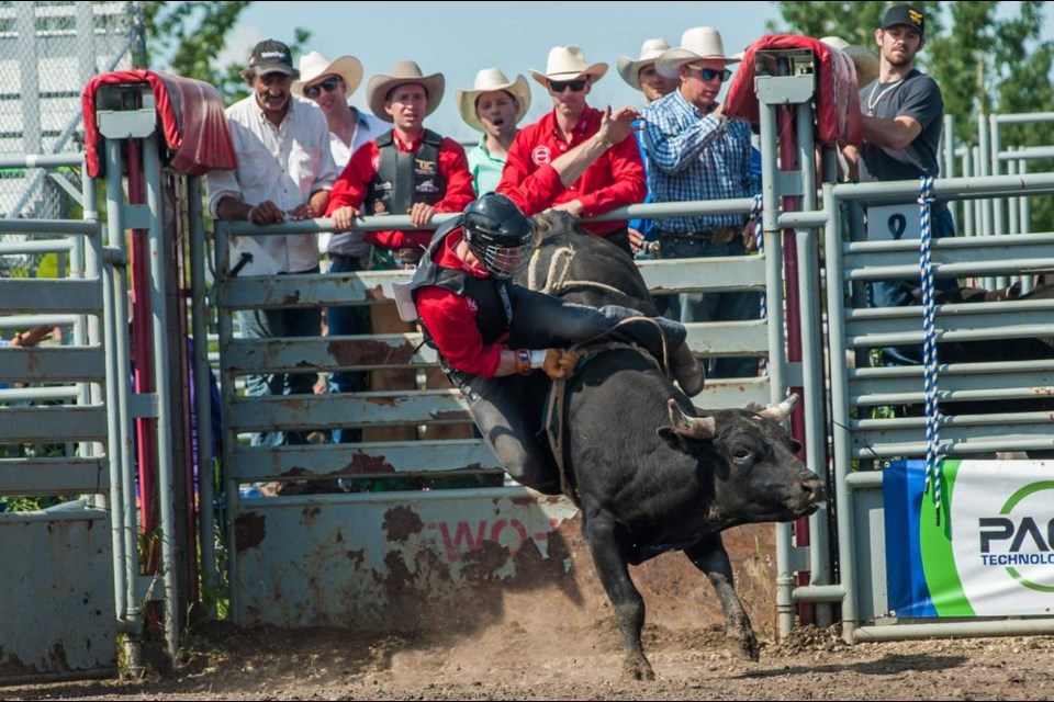 The luck of the draw had Darrel Vallie back on the same bull “with a bad attitude” twice on July 13 in St. Albert while participating in the EFRRA rodeo to raise funds for charity. His cousin, Barry Petruk of Togo, back left, looked on.