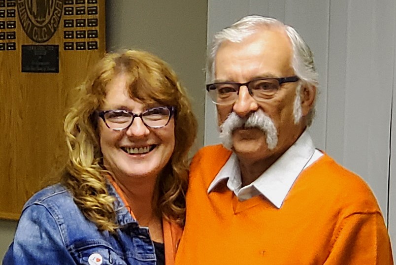 Sharon and Tom Lindsey share a moment at the campaign party following Lindsey's win in the provincial election Sept. 10. The Progressive Conservative (PC) party won a majority government, while the NDP - including Lindsey - swept all four northern ridings. - PHOTO BY ERIC WESTHAVER