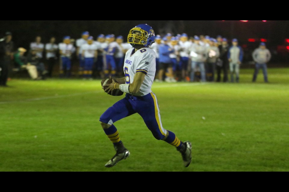 Cody Begermann of the Humboldt Mohawks runs to the end zone, scoring the team's first touchdown of the Sept. 13 home game. Photo by Devan C. Tasa