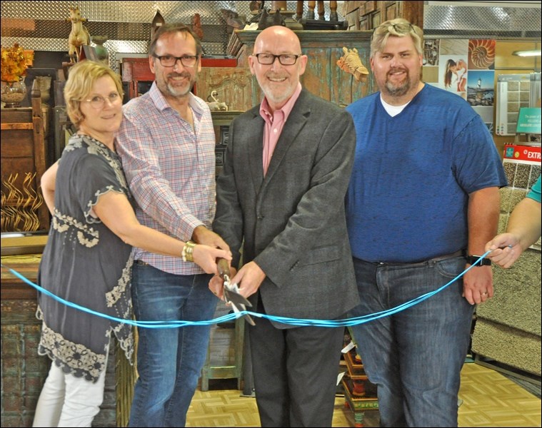 Tuesday marked the official grand re-opening of Empress – Carpet One in North Battleford, as the existing Empress Floors and Home officially joins the Carpet One chain. Seen here at the ribbon cutting are owners Stacey and Terry Caldwell, Carpet One vice-president Baxter Freake and Battlefords Chamber of Commerce chair Dallan Oberg. Photos by John Cairns