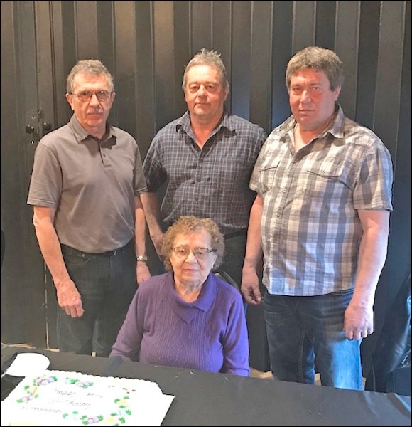 David Woloshyn, Larry Woloshyn and John Woloshyn seen with their mother Olga Woloshun at her 90th bi