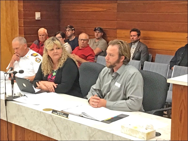 City Planner Ryan Mackrell speaks at city council meeting Monday on a discretionary use application