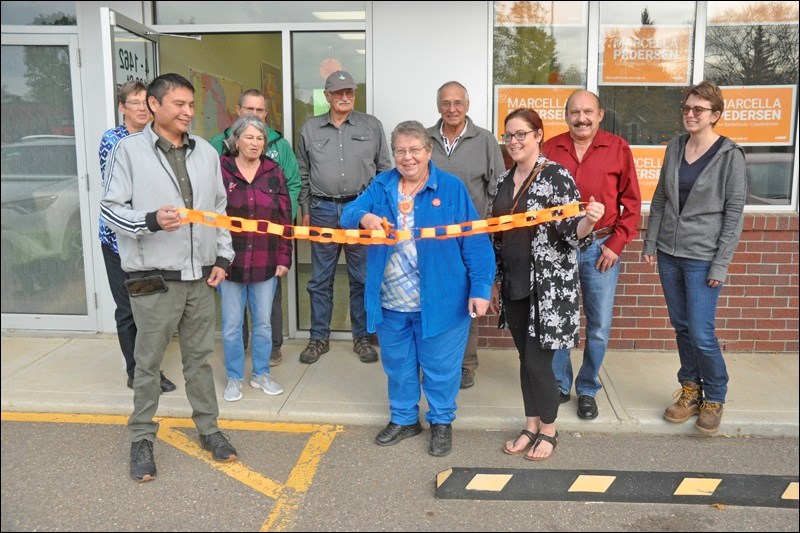 The ribbon-cutting at the campaign office of NDP candidate Marcella Pedersen in North Battleford. Pedersen’s office is now open. Photos by John Cairns