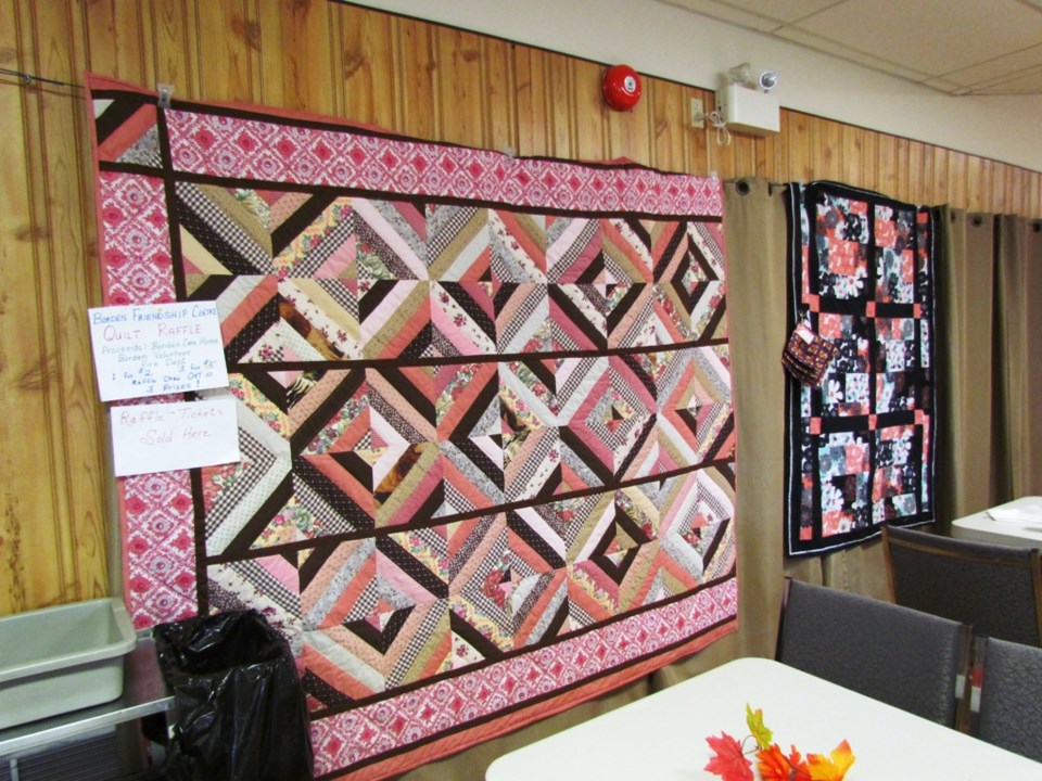 A quilt and lap throw were raffled off by Borden Friendship Club Oct. 10, with proceeds to the Borde