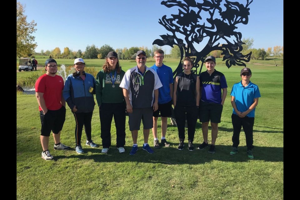 The KCI senior golf team, from left, were: Kade Wishnevetski, Lilyanna Quewezance, Curtis McGriskin, David Placatka (coach), James Dungen, Sadie McGriskin, Zac Zbeetnoff and Aidan Broda.