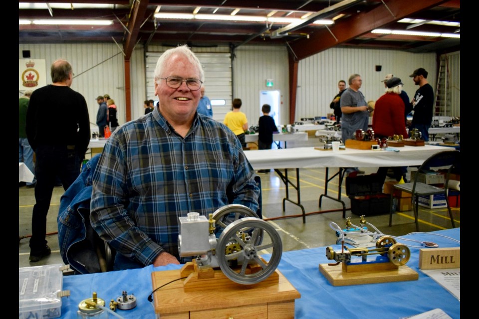 Merve Young and his latest project – hit and miss steam engine. Photo by Anastasiia Bykhovskaia