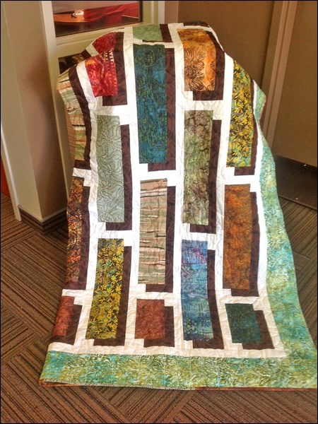 This quilt, made by the Meota Quilters is on display at the Credit Union, where one can purchase tic