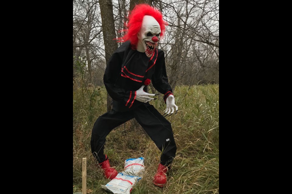 Crouchy the 11-foot clown was among the frightening sights that people saw on the Trail of Terror this year. Photo submitted