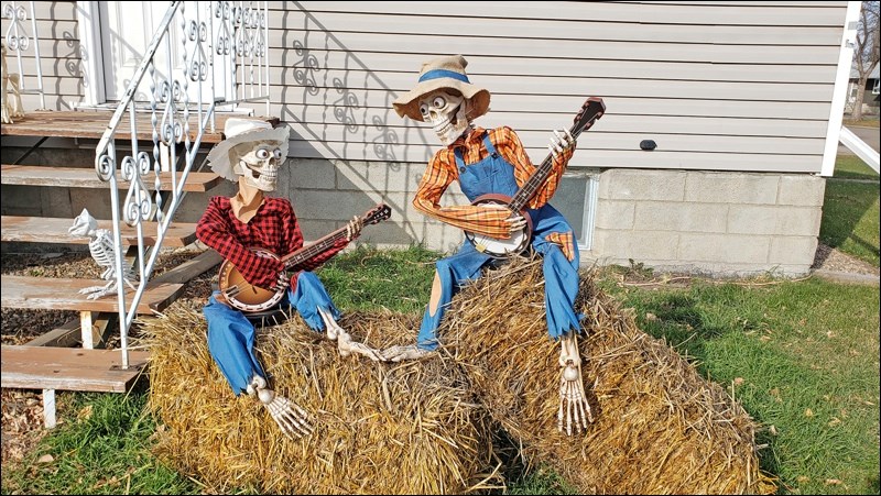 Harmonizing for Halloween, these characters displayed at a home in Unity show the fun side of Halloween spirit. Photos by Sherri Solomko.