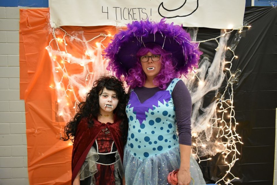Meredith Burback of Togo, left, was a Zombie at the KCI Fun Night Spookarama and her mother, Amanda, was a monster. “We just love to dress up in costumes,” they said.