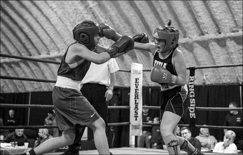 Alexandra Brochue spars it out with Britynn Carter, who won the match.