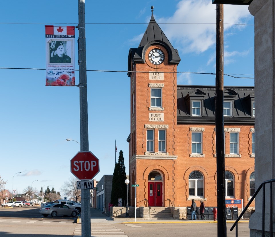 Banner of Bernard (Bernie) Charles Edwards with the post office in background_resized.jpg