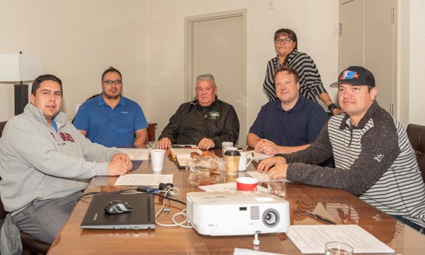 Winners of the Saskatchewan Municipal Award: chiefs Bradley Swiftwolfe (Moosomin), Laurence Paskemin (Sweetgrass), Wayne Semaganis (Little Pine), Mayor Ryan Bater (North Battleford), Kenny Moccasin (Saulteaux); standing is Crytal Okemow (Lucky Man). Photo by Averil Hall