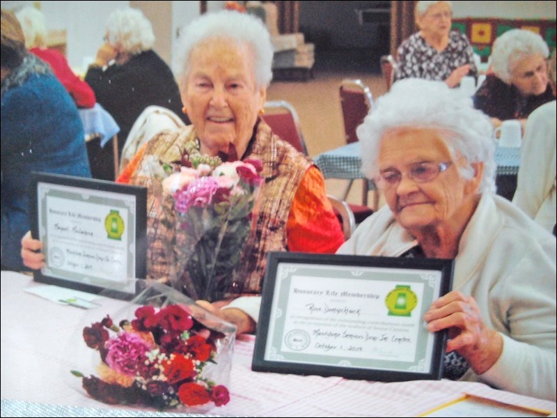 Maidstone Library members sponsored a tea at the centre to honour two longtime members who turned 90
