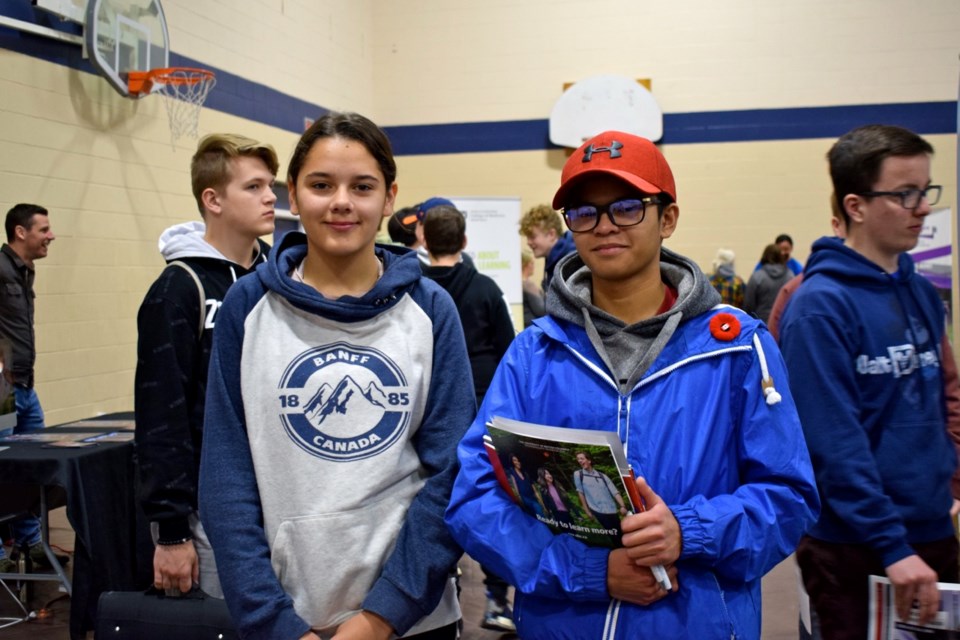 Carr-Lee Hamilton, Grade 9, and Joseph Limin, Grade 12, were exploring opportunities the ECS Career Fair had to offer. Photo by Anastasiia Bykhovskaia