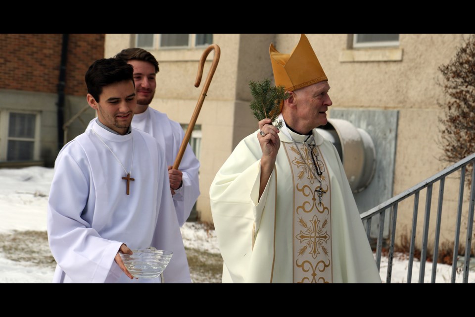 Like Abbot Michael Ott did exactly a century earlier, Bishop Mark Hagemoen blessed the building that is now the St. Therese Institute of Faith and Mission on Nov. 9. Photo by Devan C. Tasa