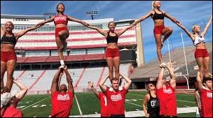 This college cheer team became an all-girl squad due to rule changes. In 2005, the college grounded